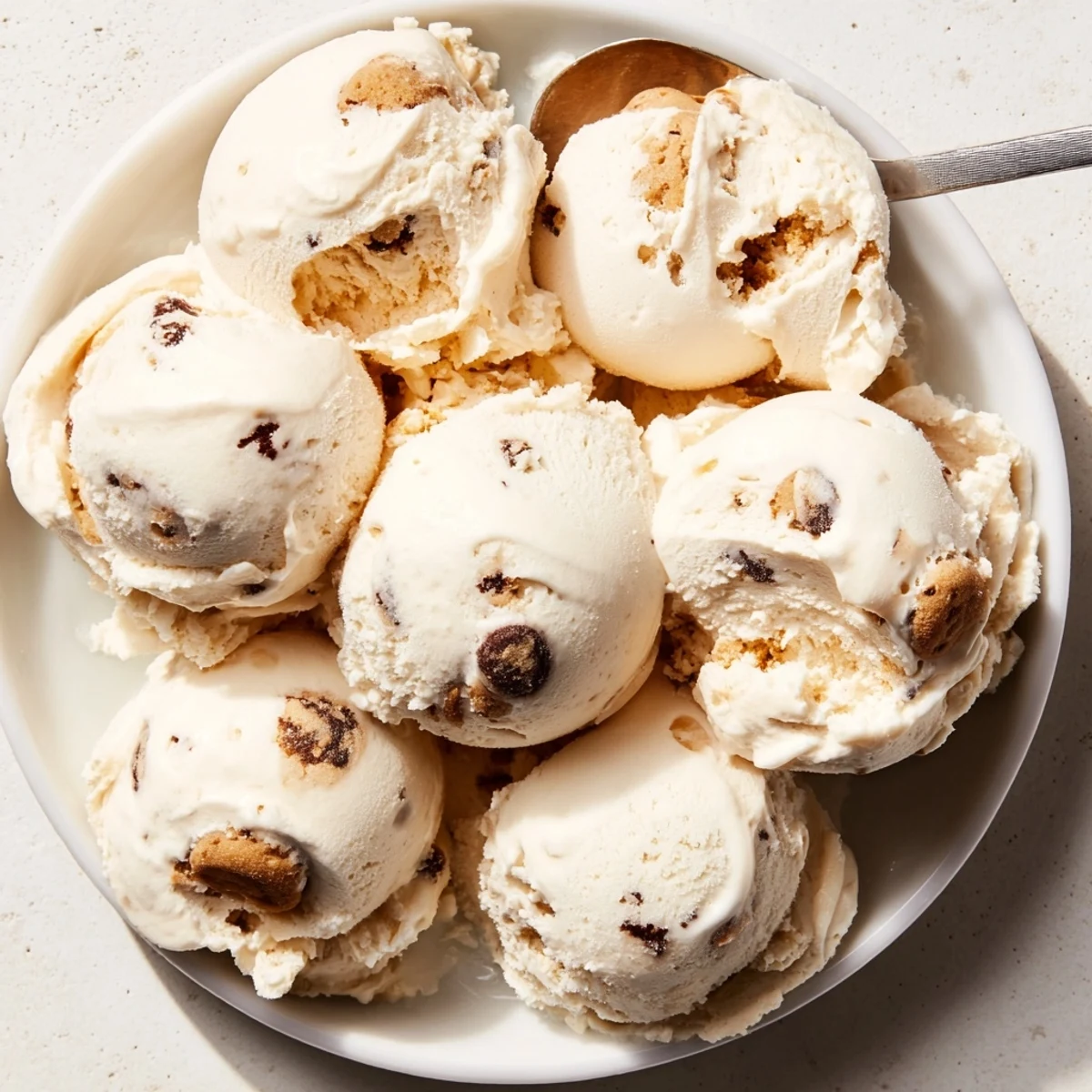 Creamy cottage cheese ice cream with cookie dough bites, a delightful frozen treat.  