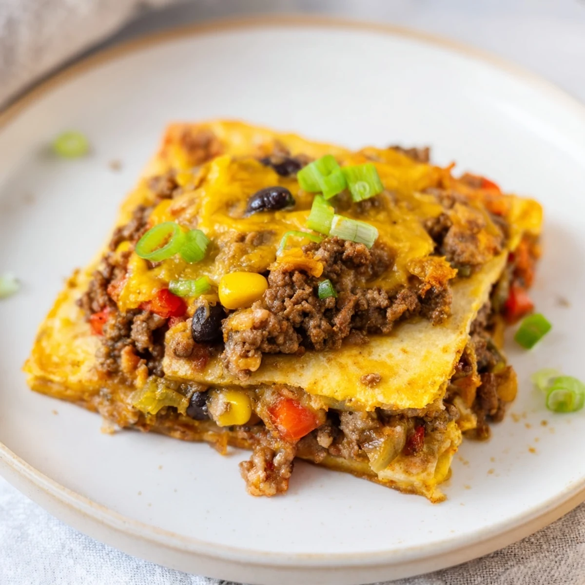 Golden-brown Sheet Pan Quesadillas with Beef showcase tender beef filling, perfect for a flavorful family dinner.