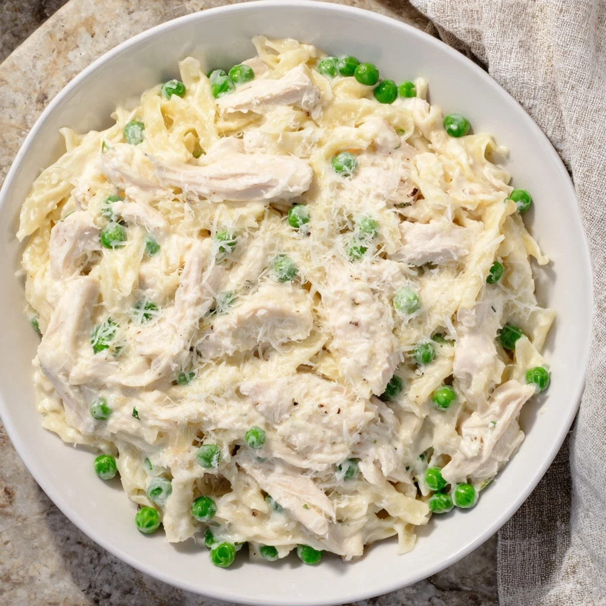 Golden, steaming Creamy Chicken Alfredo, ready to serve, offers a satisfying, easy dump meal experience.
