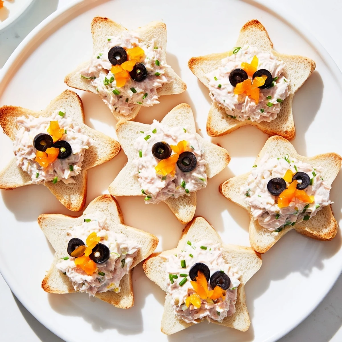 Freshly made Mini Starfish Sandwiches are filled with tuna salad; a cute and easy party food.