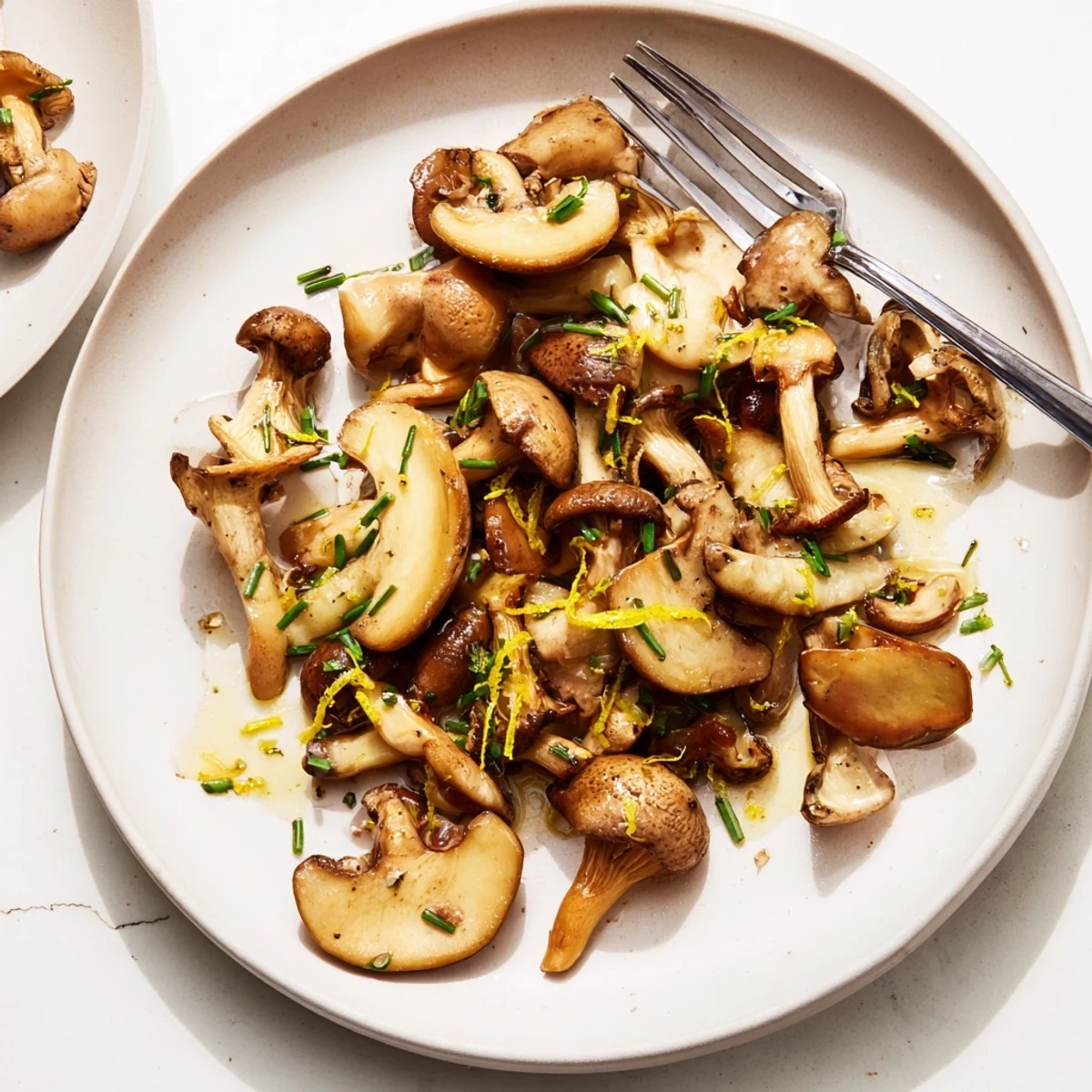 A close-up of the delicious Enchanted Forest Mushrooms, perfectly sautéed with garlic in white wine.