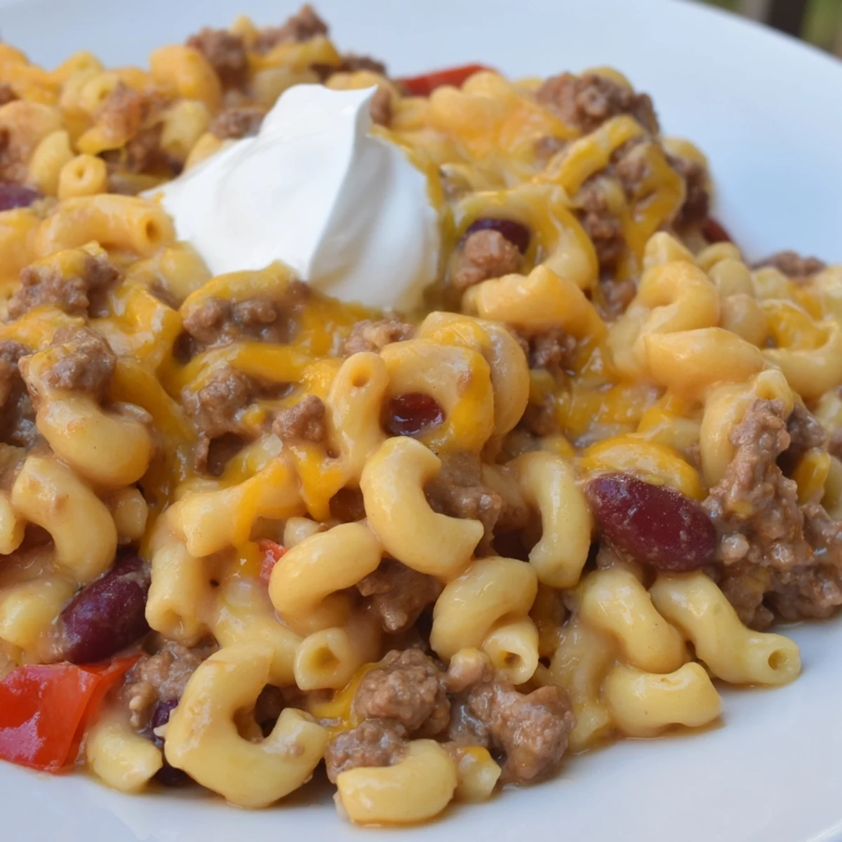 Golden, cheesy One-Pot Chili Mac in a large pot, steaming and ready to serve.