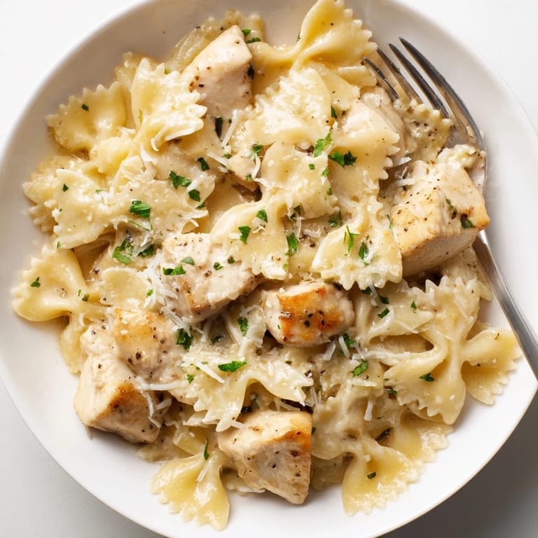 Delicious Mozzarella Garlic Butter Chicken Bowties, featuring tender chicken and melted cheese.  