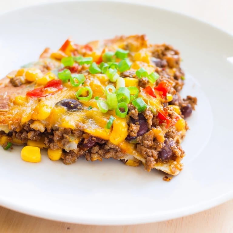 These Sheet Pan Quesadillas with Beef feature layers of savory beef filling and bubbly cheese—ready to serve!